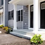 Welcoming, landscaped entryway to Saddle Rock Way townhome unit, located in Manchester, NH