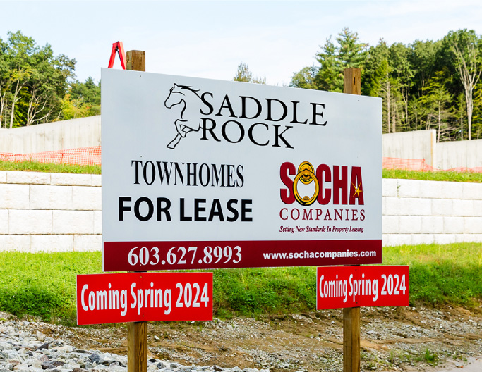 Welcome home sign for Saddle Rock by Socha Companies