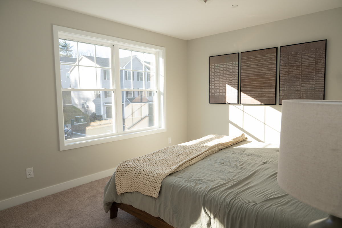 Master Bedroom of a 3 Bedroom Unit in the Saddle Rock Way, a high-end townhouse community by Socha Companies in Manchester NH